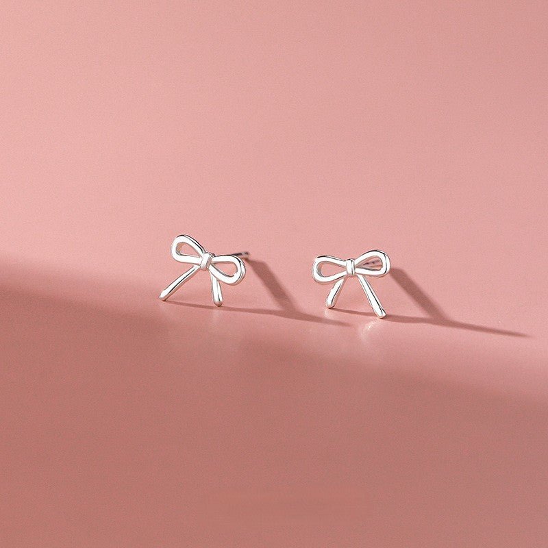 Bow Elegance – S999 Feinsilber Ohrstecker im filigranen Schleifen - Design - AuraGleam