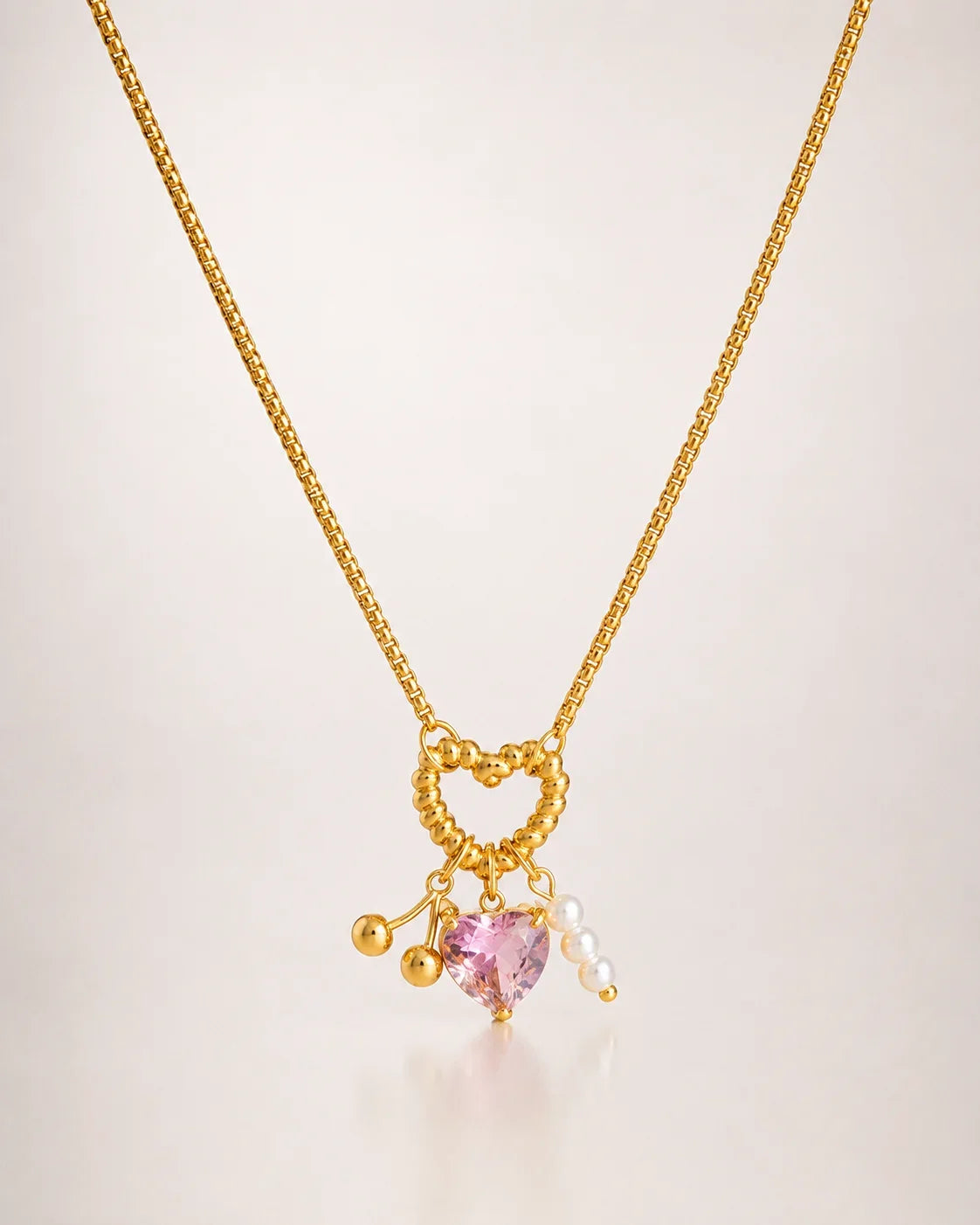 Goldene Herz Halskette mit offenem Herz-Anhänger, rosa Herz-Zirkonia und kleiner Perle