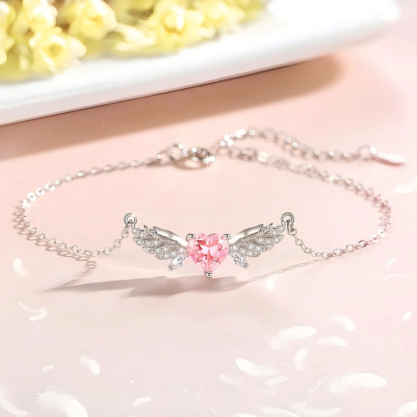 Zartes 925 Sterling Silber Armband "Angelina" mit einem rosa Zirkonia-Herz und funkelnden Engelsflügeln am Handgelenk
