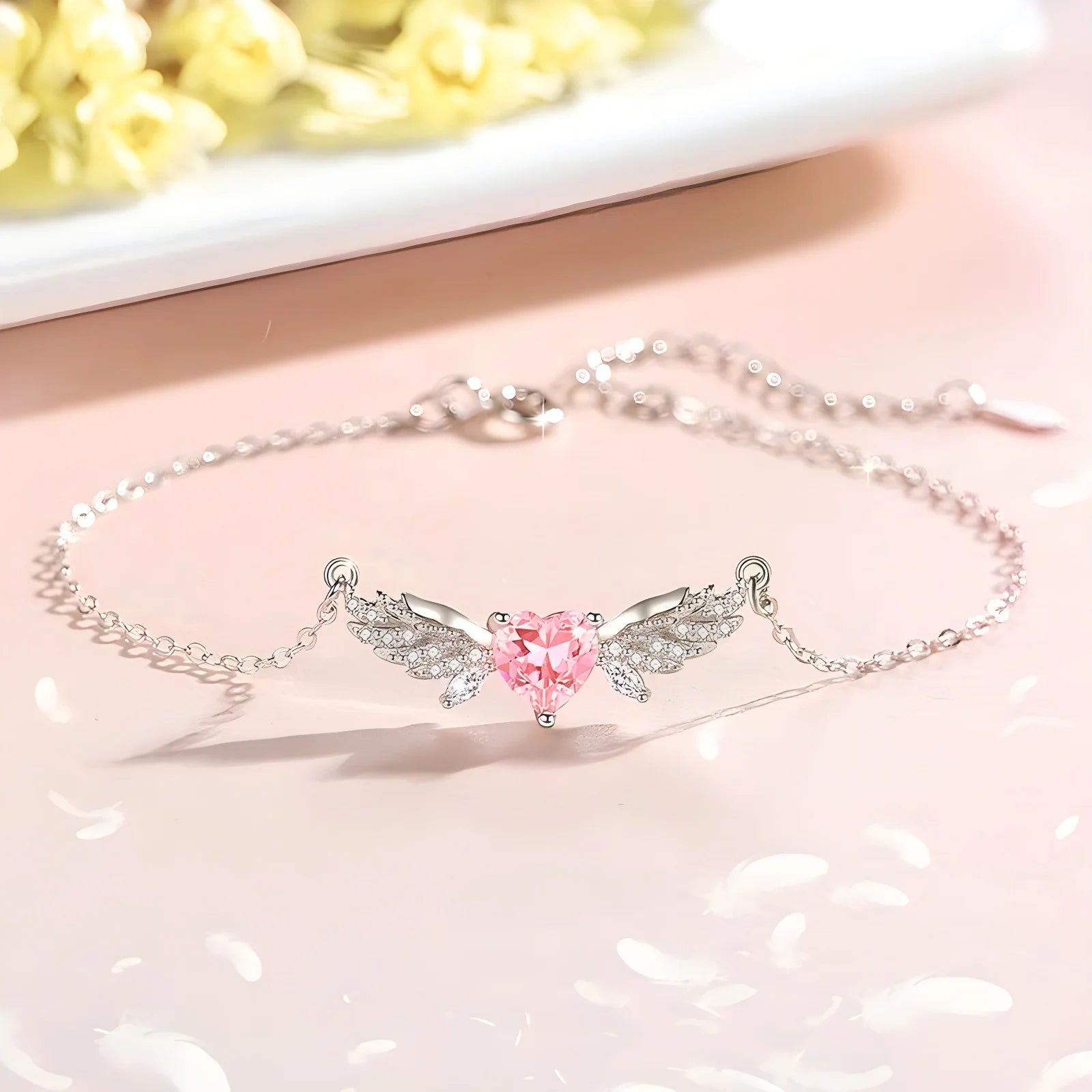 Zartes 925 Sterling Silber Armband "Angelina" mit einem rosa Zirkonia-Herz und funkelnden Engelsflügeln am Handgelenk