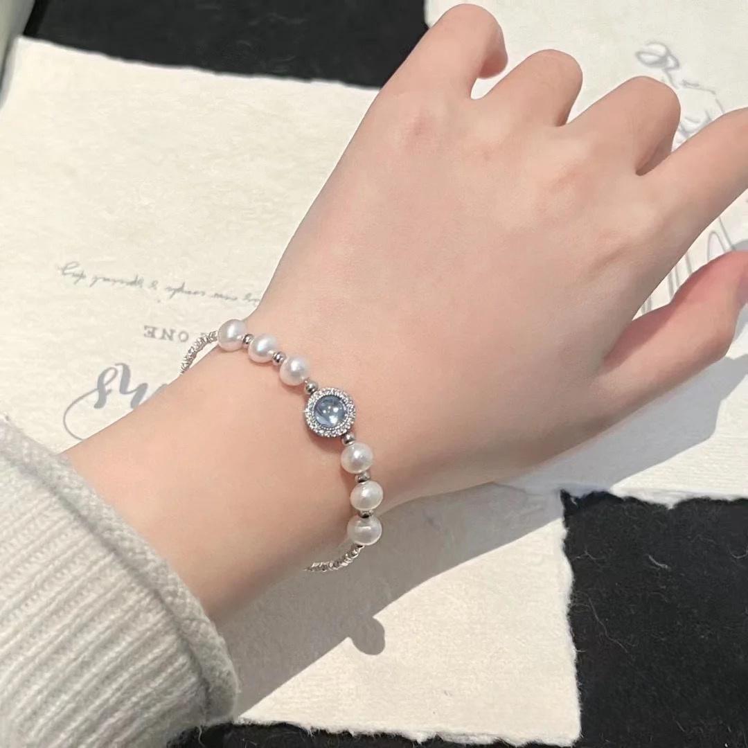 Elegantes Armband mit natürlichen Süßwasserperlen, glänzendem Aquamarin und 925er Silber – zarter Armschmuck mit Swarovski Kristallakzenten