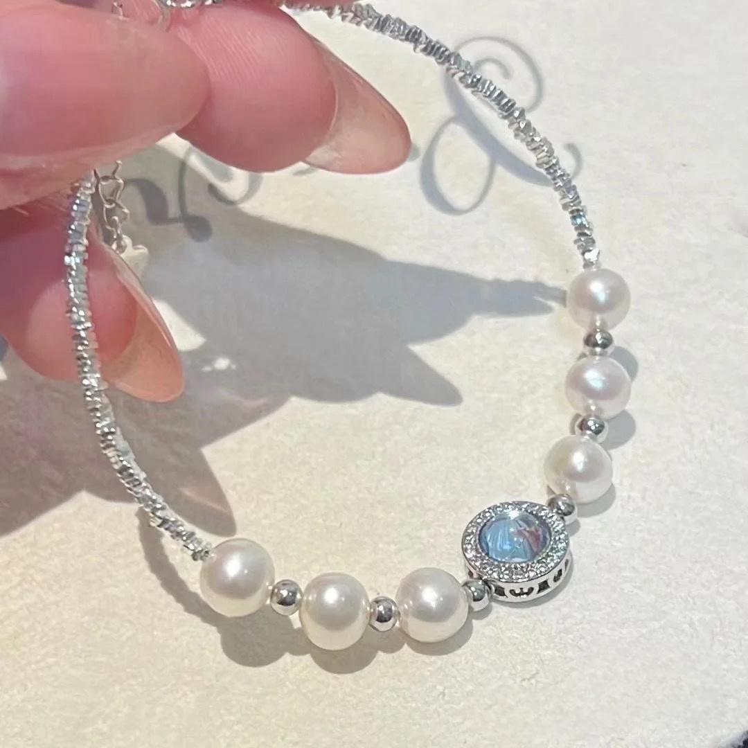 Elegantes Armband mit natürlichen Süßwasserperlen, glänzendem Aquamarin und 925er Silber – zarter Armschmuck mit Swarovski Kristallakzenten