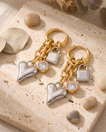 Cleo Charm Ohrringe in Gold und Silber mit Herz Schloss und Zirkonia