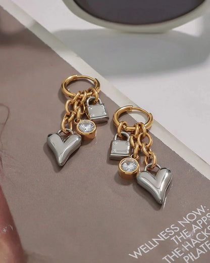 Cleo Charm Ohrringe in Gold und Silber mit Herz Schloss und Zirkonia