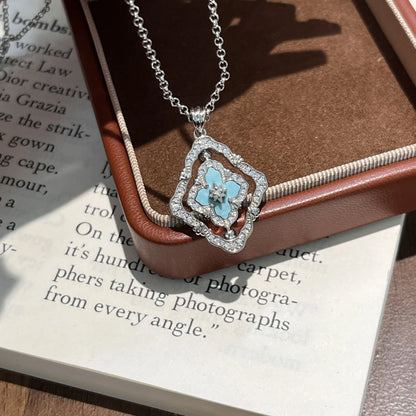 Goldene drehbare Halskette mit vierblättrigem Kleeblatt, rote Emaille und Zirkonia