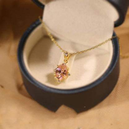 Goldene Halskette aus 925 Silber mit ovalem rosa Rosenquarz Anhänger