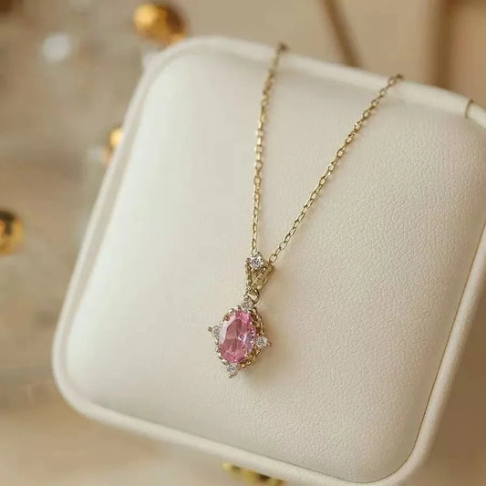 Goldene Halskette aus 925 Silber mit ovalem rosa Rosenquarz Anhänger