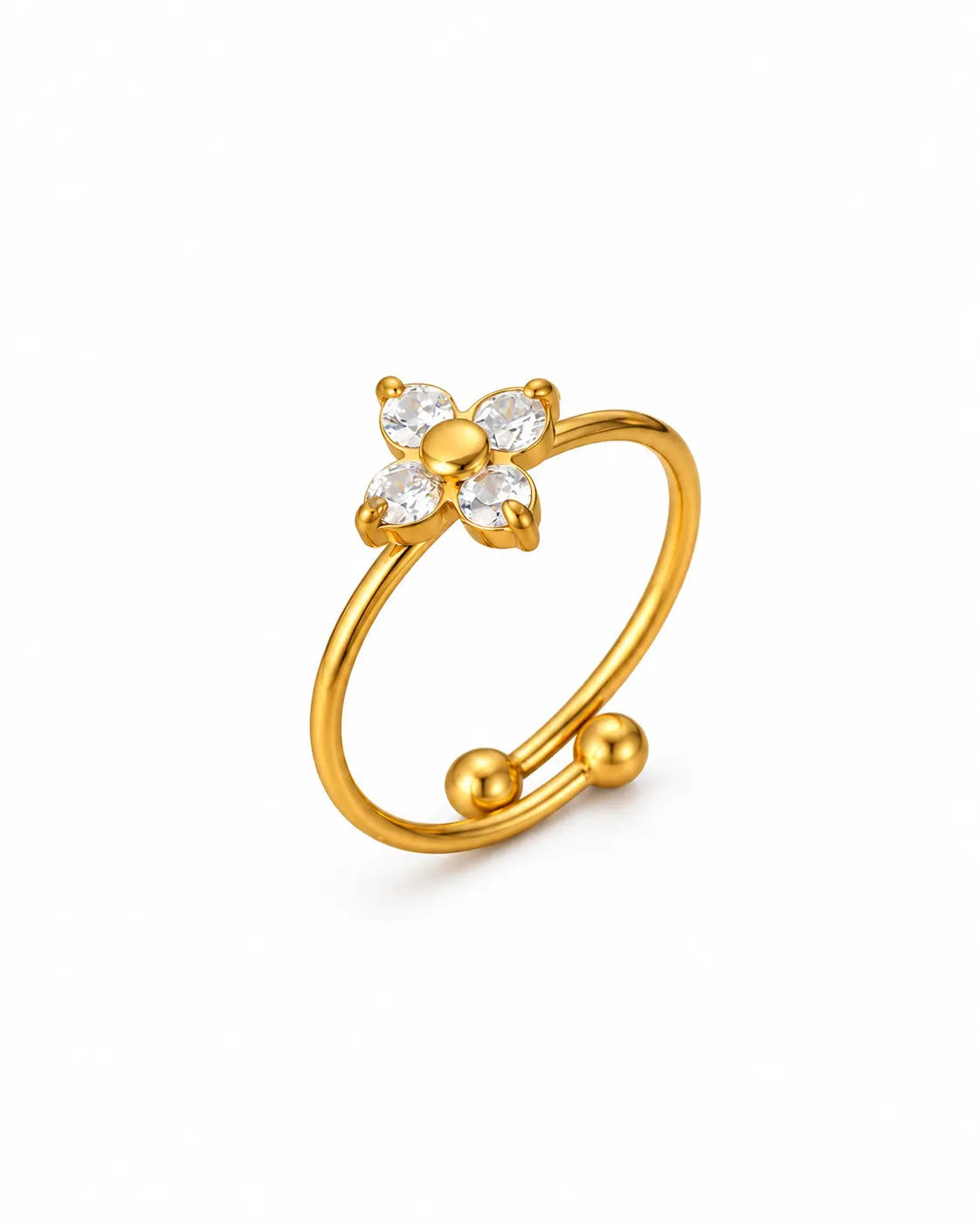 Goldener Elina Zirkonia Blumenring aus 18K-vergoldetem Edelstahl mit vier klaren Steinen und offener Ringschiene auf Weiß