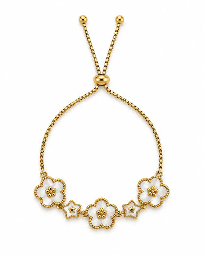 Goldenes Blumen Armband mit weißen Emaille-Blüten und verstellbarem Schiebeverschluss