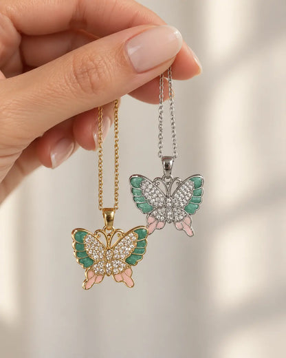 Goldene und silberne Schmetterling Halskette mit mintgrüner und rosa Emaille