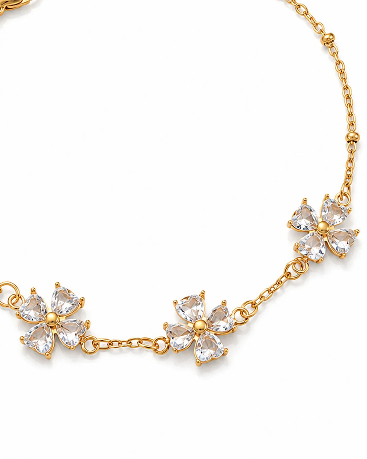 Vergoldetes Blumenarmband mit funkelnden Zirkonia Blüten