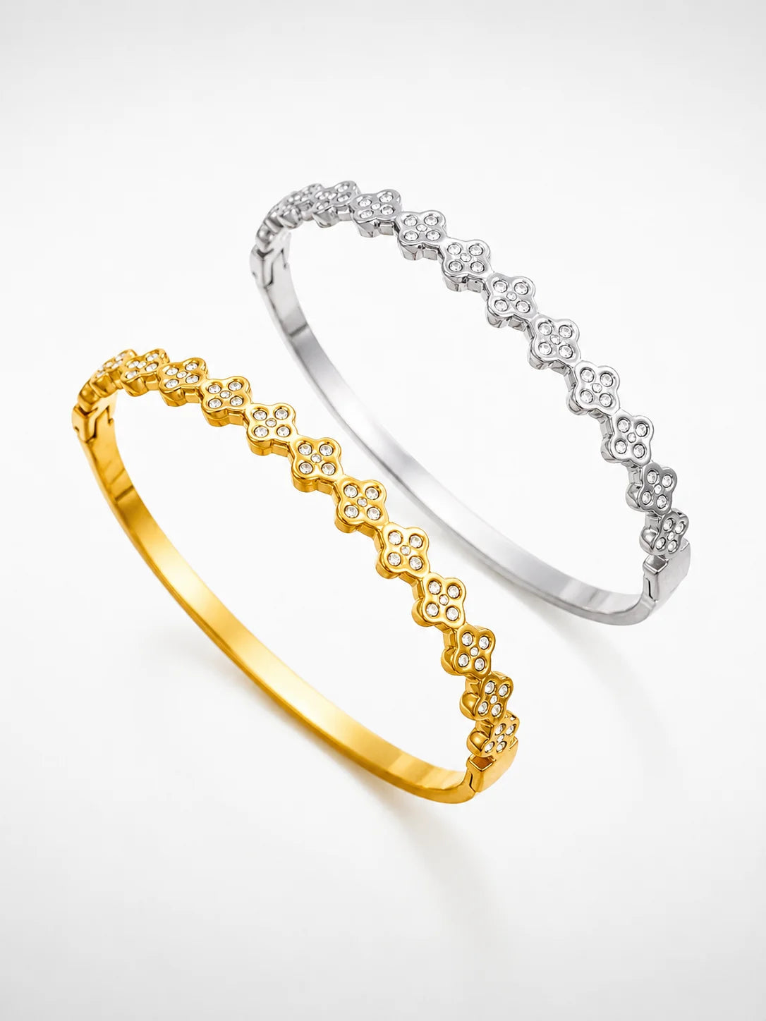Glitzerndes Kleeblatt-Muster Armreif aus Titanstahl in Gold und Silber mit Zirkonia-Besatz