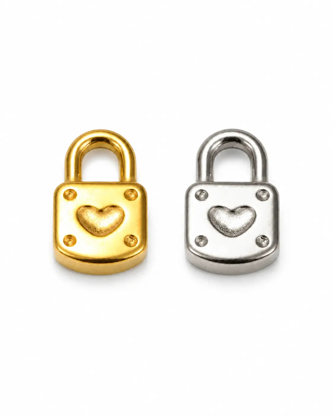Luna Schloss Charms in Gold und Silber mit Herzmotiv und runden Zierdetails auf weißem Hintergrund