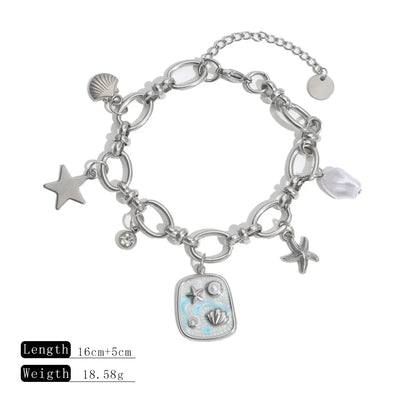 Silbernes Titanstahl-Armband "Marina" mit Meeres-Anhängern (Muschel, Seestern) und Emaille-Plättchen