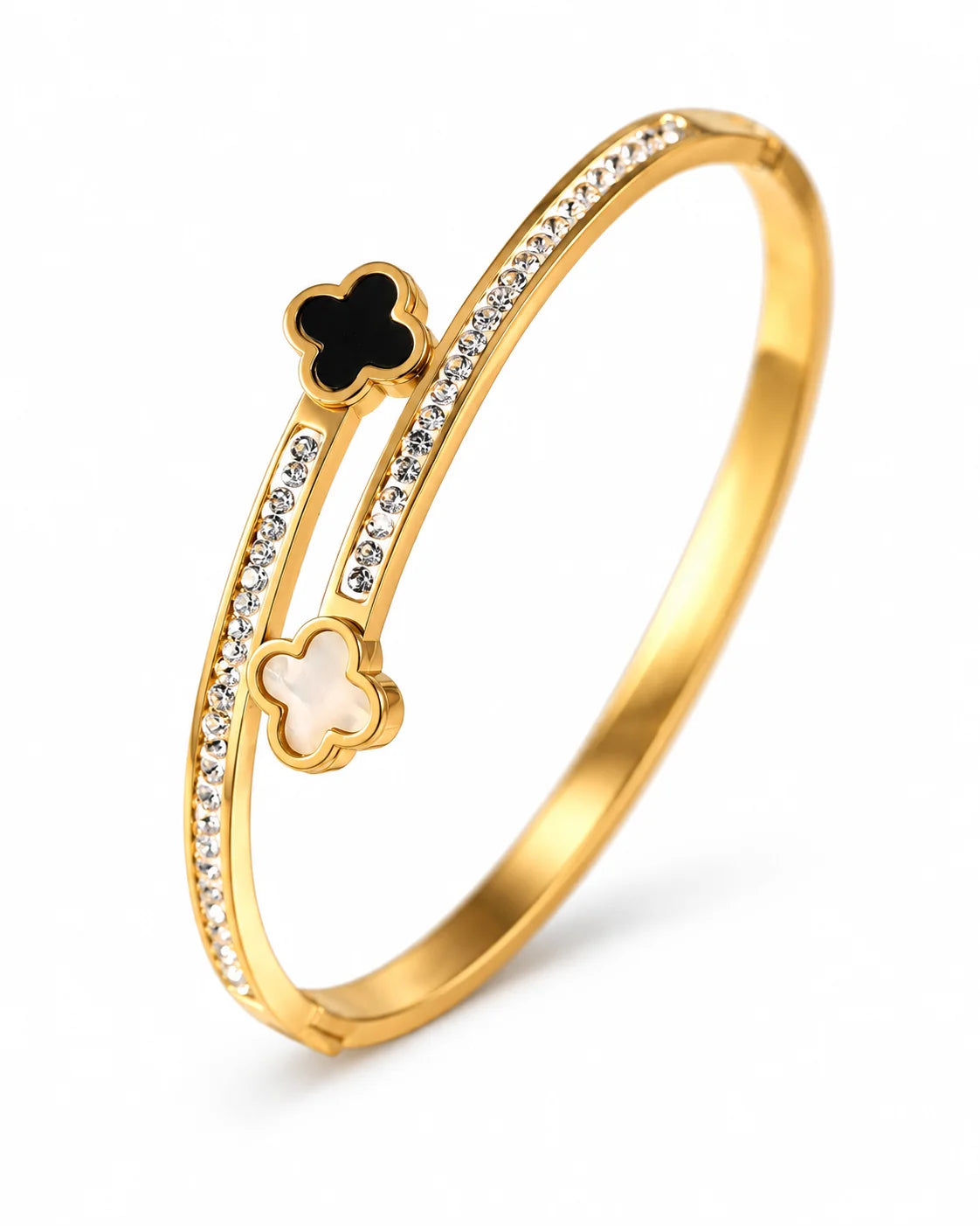 Mila gold-tone clover bangle with black and white motifs