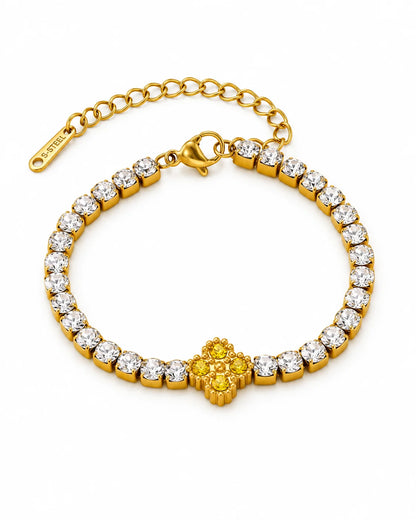 Goldenes Tennisarmband mit gelbem Kleeblatt Zirkonia