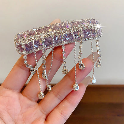 Funkelnde lila Kristall-Haarspange "Sasha" mit rautenförmigem Strass-Muster und acht hängenden Kristall-Quasten