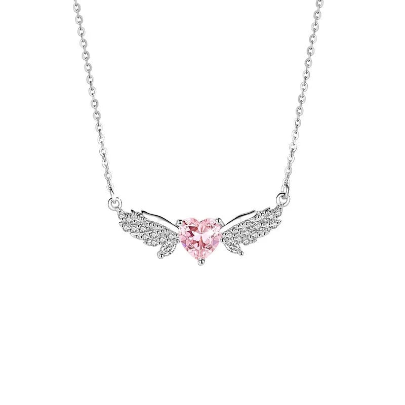 Filigrane 925 Sterling Silber Halskette "Seraphina" mit rosa Zirkonia-Herz und funkelnden Engelsflügeln