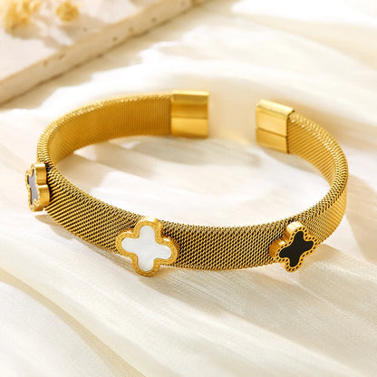 18k vergoldeter Mesh-Armreif "Siena" aus Edelstahl mit schwarzen und weißen Kleeblatt-Elementen