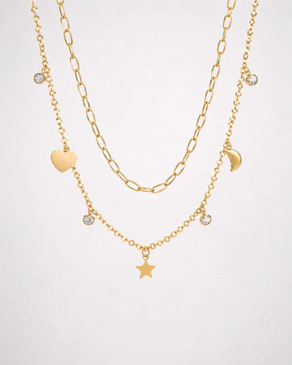 Mehrreihige Stern & Mond Layering Halskette aus 18K vergoldetem Titanstahl mit verschiedenen Charms und Zirkonia-Kristallen