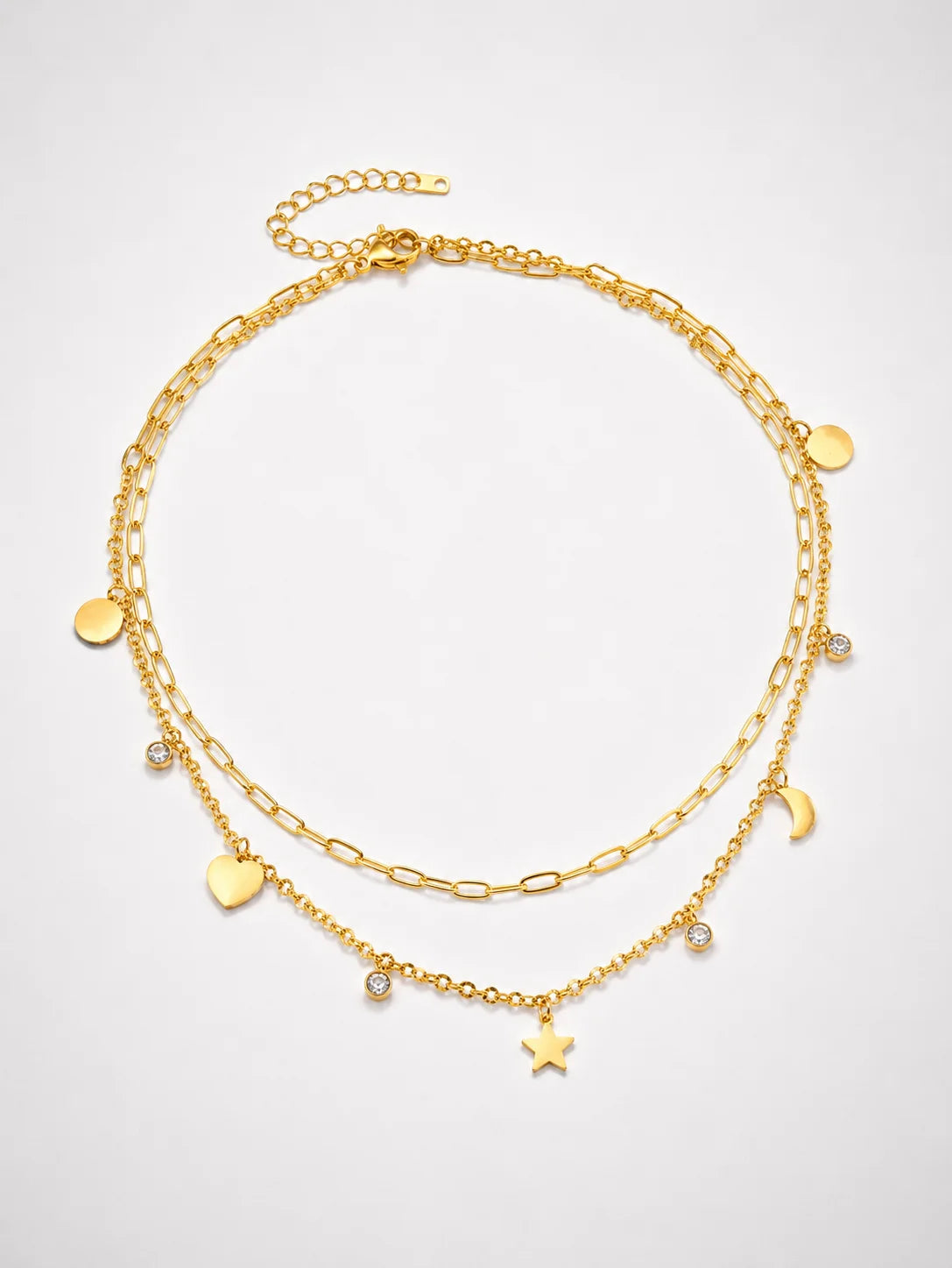 Mehrreihige Stern & Mond Layering Halskette aus 18K vergoldetem Titanstahl mit verschiedenen Charms und Zirkonia-Kristallen