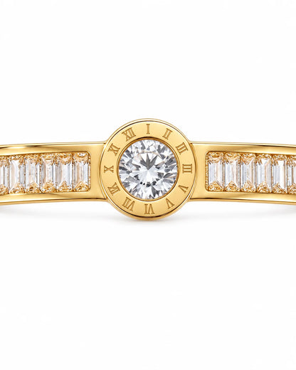 Goldener Armreif mit Baguette Zirkonia und rundem Mittelstein