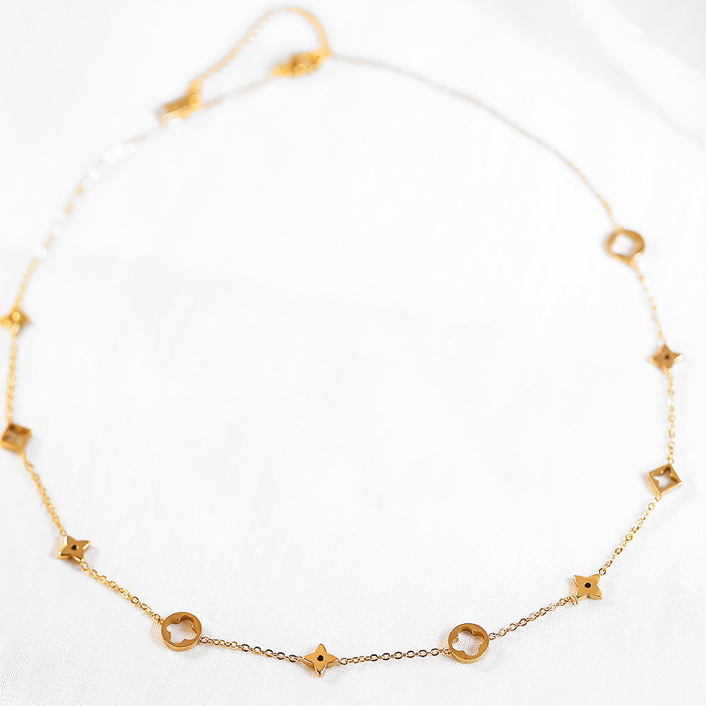 Vergoldete Titanstahl-Halskette mit Kleeblatt- und Sternsymbolen