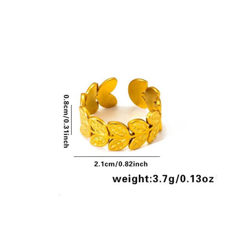 Vergoldeter Edelstahlring mit offenen, zarten Blattmustern und matter Oberfläche