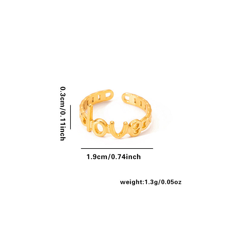 Goldener Edelstahlring mit dem Wort „love“ im Schriftzug-Design und glänzender Oberfläche