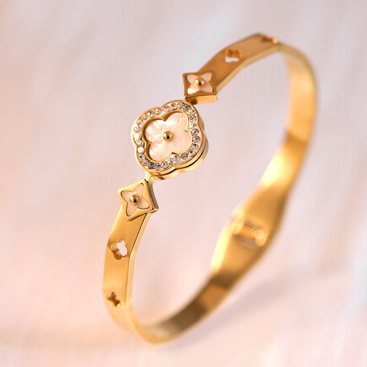 Vergoldeter Damenarmreif mit Blüten-Design, Perlmutt-Einlagen und Zirkonia