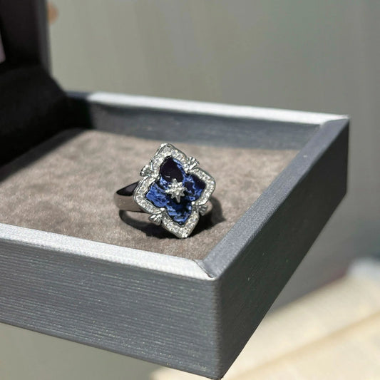 Verstellbarer silberner Ring mit blauem Stein und Zirkonia im Vintage Stil
