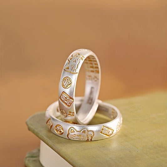 Handgefertigter Ring aus 999er Feinsilber mit kunstvoll vergoldeten Gravuren – Glücksmotive wie Winkekatze und chinesische Schriftzeichen, verstellbares Design für Damen und Herren