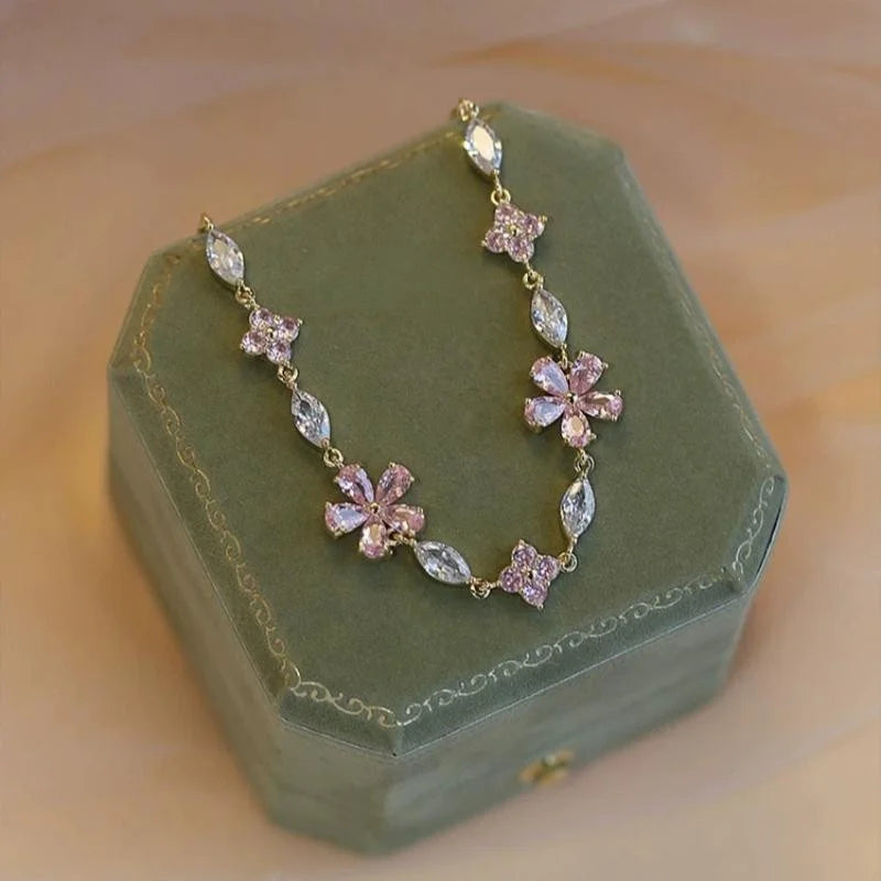 Massives 925 Sterling Silber Armband "Yuna" mit rosa Kirschblüten aus Zirkonia und silbernen Blättern