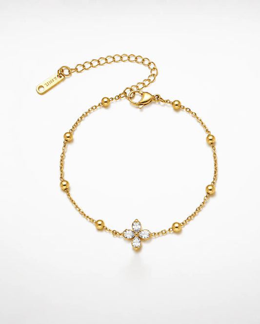 Zartes Blüten-Glanz Armband aus vergoldetem Titanstahl mit Zirkonia-Blüte und Goldperlen auf goldenem Satin