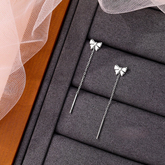 Bow Elegance – S999 Feinsilber Ohrringe mit filigranem Schleifen - Design und eleganter Ohrkette - AuraGleam