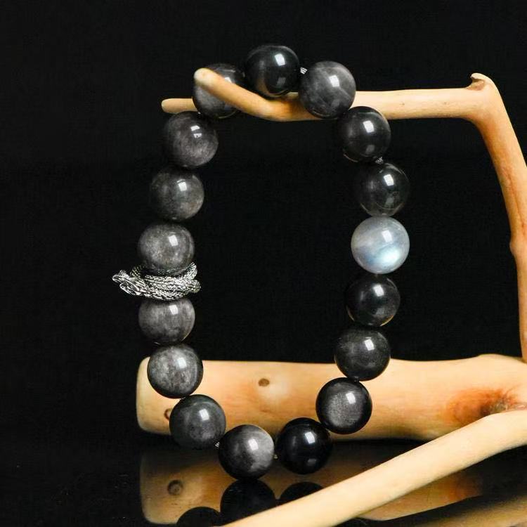 Maskulines Herrenarmband mit 12mm Silberobsidian und grauem Mondstein – kombiniert mit silbernem Drachen-Element als stilvoller Blickfang