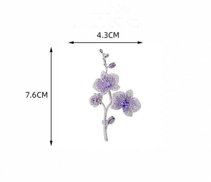Orchideenblüte – Brosche mit violetten Kristallen - AuraGleam