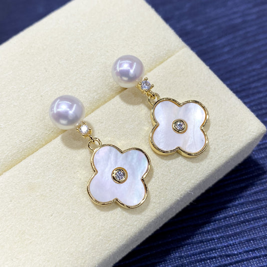Elegante Ohrstecker aus 925er Silber mit schimmernder Perle, Muschelblume-Anhänger und funkelndem Zirkonia – feminines Design mit natürlichem Glanz
