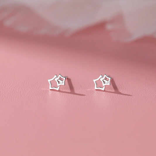 Starry Charm – S999 Feinsilber Ohrrstecker im modischen Stern - Design - AuraGleam