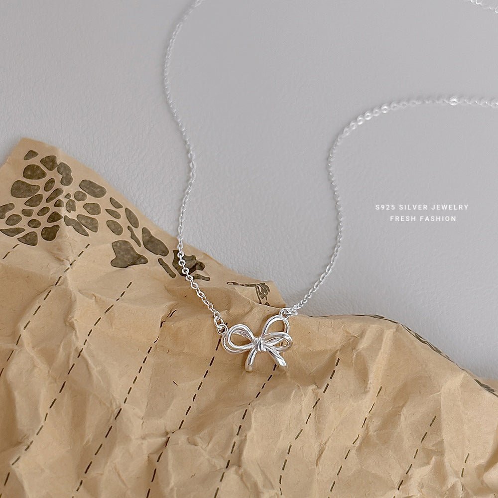 Sweet Bow – S925 Silber Halskette mit zarter Schleife (verstellbar) - AuraGleam
