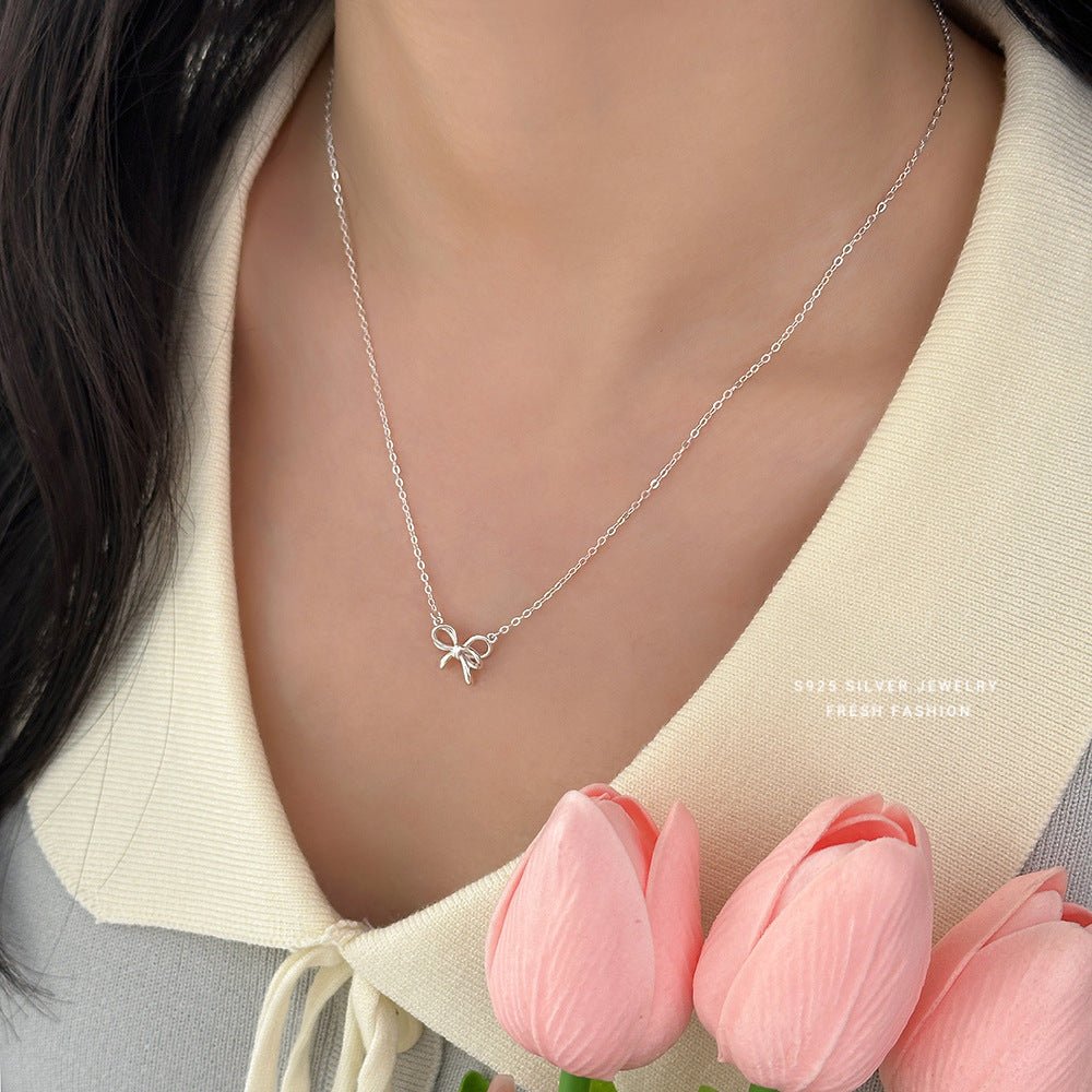 Sweet Bow – S925 Silber Halskette mit zarter Schleife (verstellbar) - AuraGleam