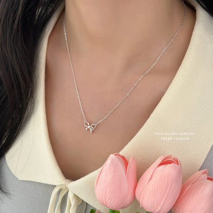 Sweet Bow – S925 Silber Halskette mit zarter Schleife (verstellbar) - AuraGleam