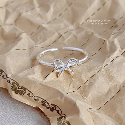 Sweet Bow – S925 Silberring mit zartem Schleifen - Design (verstellbar) - AuraGleam