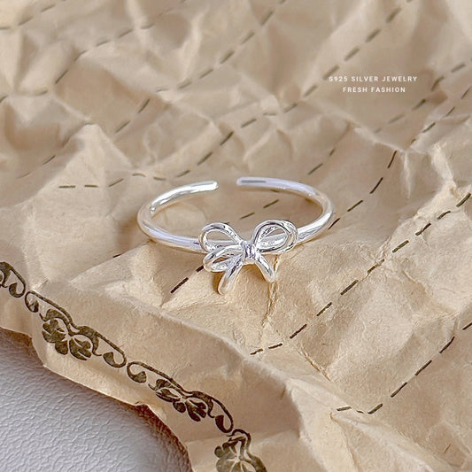 Sweet Bow – S925 Silberring mit zartem Schleifen - Design (verstellbar) - AuraGleam